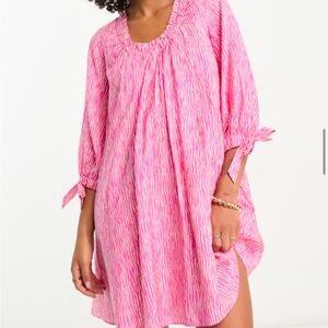 Vibrant Pink Patterned Dress with Bow Sleeves